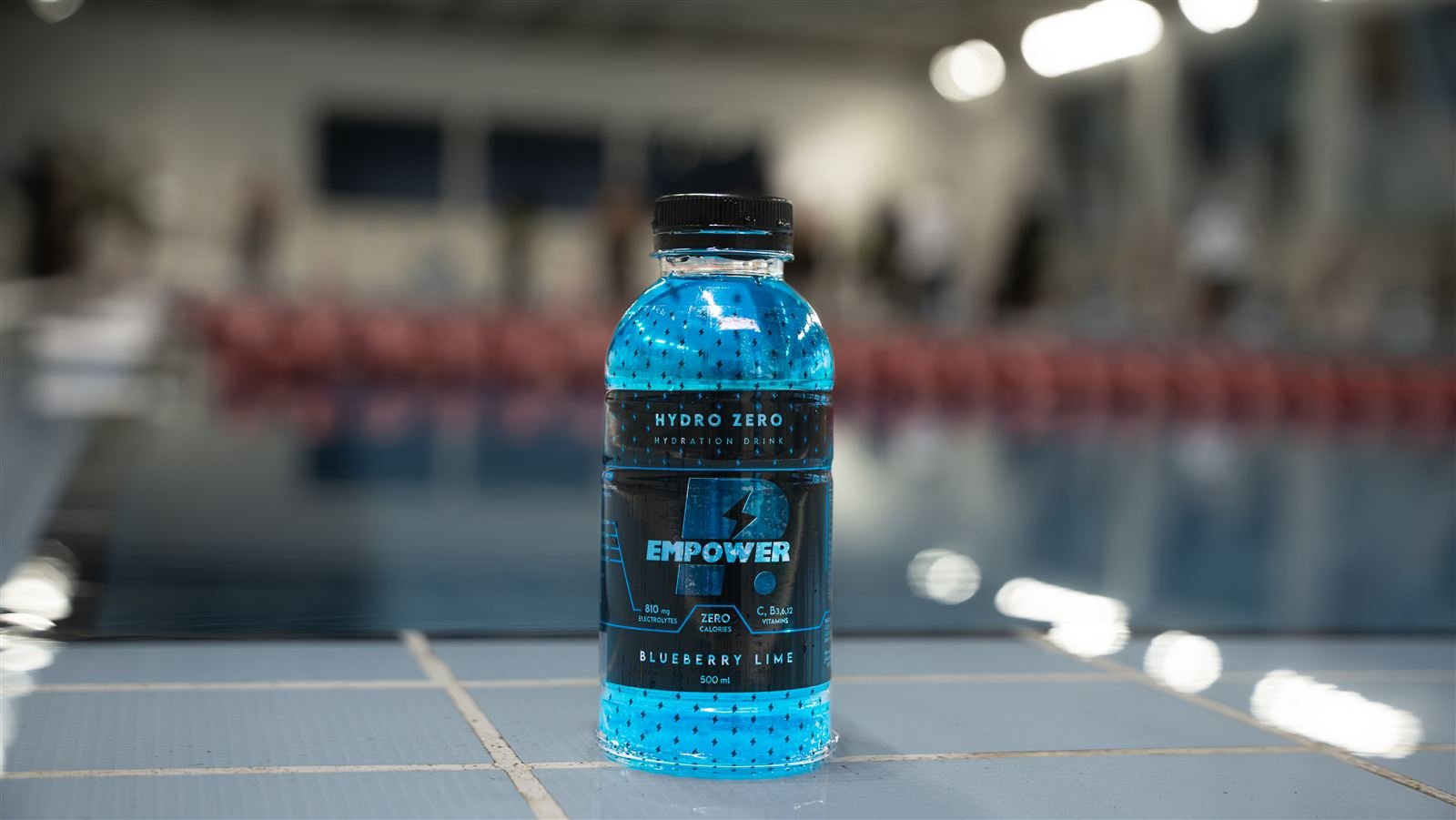 Hydro Zero Blueberry Lime bottle at the poolside